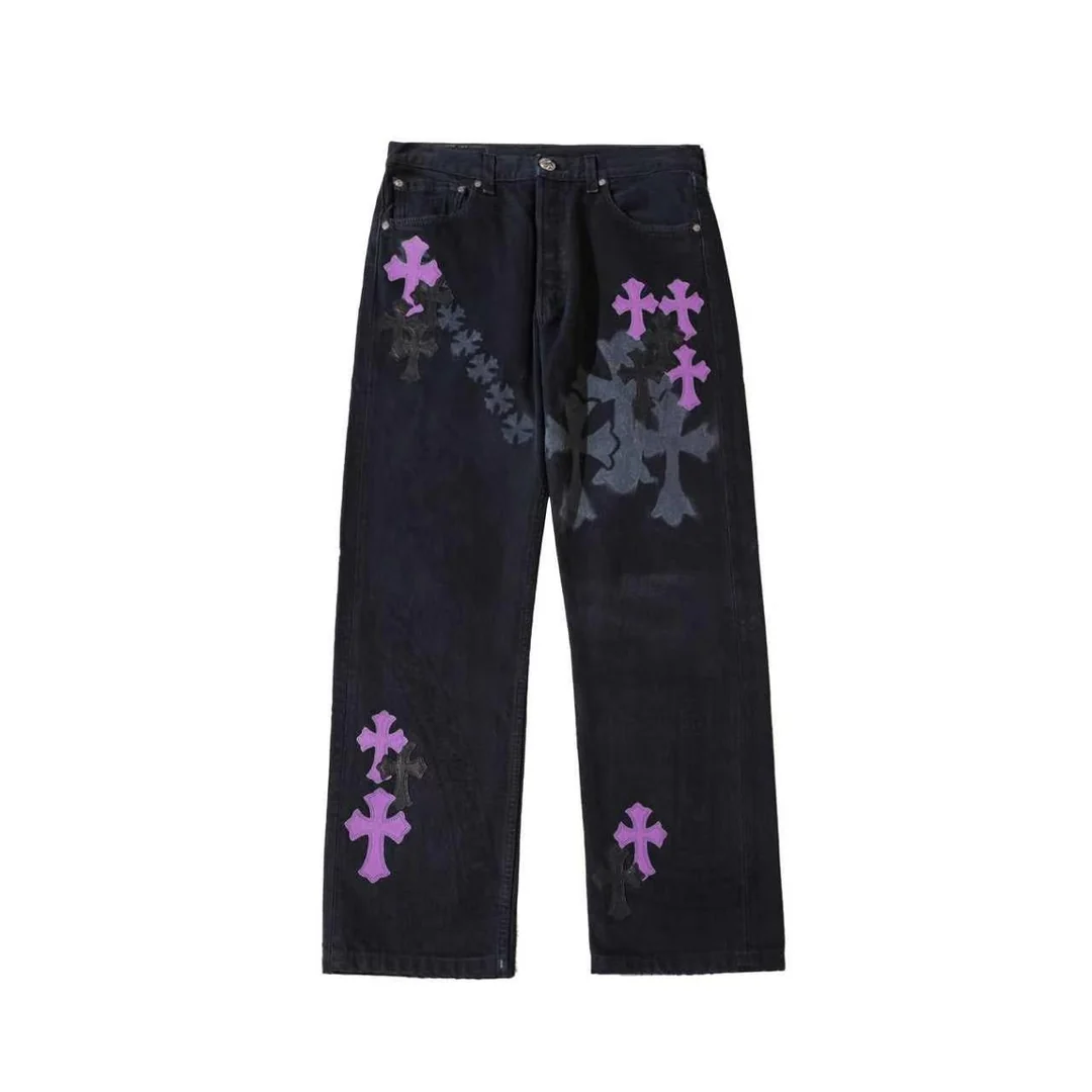 Chrome Hearts black denim jeans with purple cross patches and spray print, front view Chrome Hearts black denim jeans with purple cross patches and spray print, front view