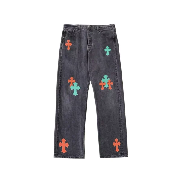 Chrome Hearts grey denim jeans with orange and green Miami cross patches, front view
