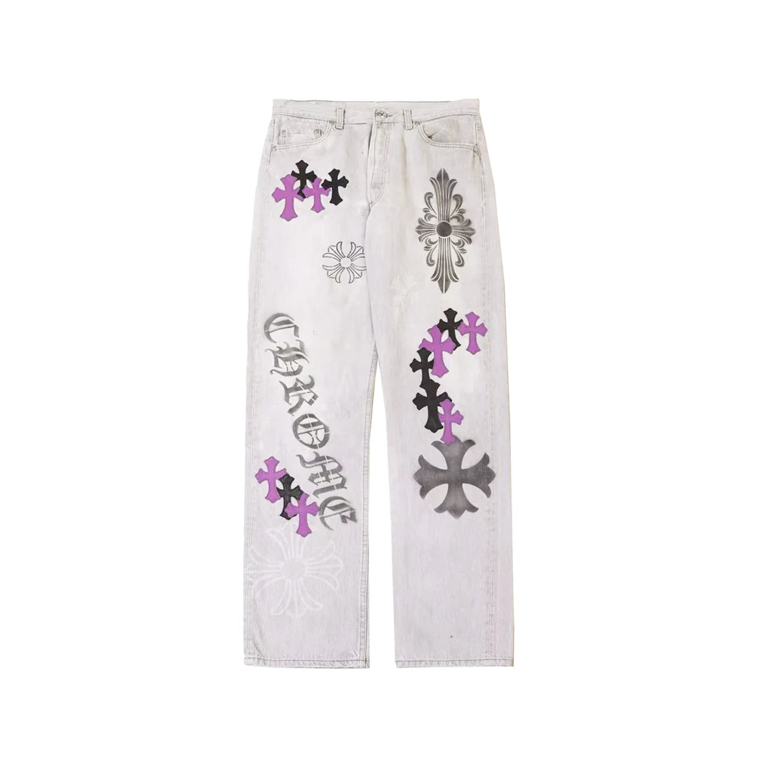 Chrome Hearts washed grey denim jeans with purple leather cross patches, front view Chrome Hearts washed grey denim jeans with purple leather cross patches, front view
